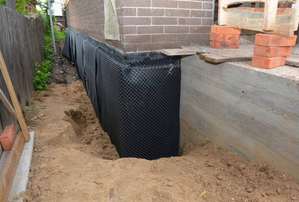 SJ Waterproofing Pros technician performing targeted Waterproofing assessment in Vickery, OH